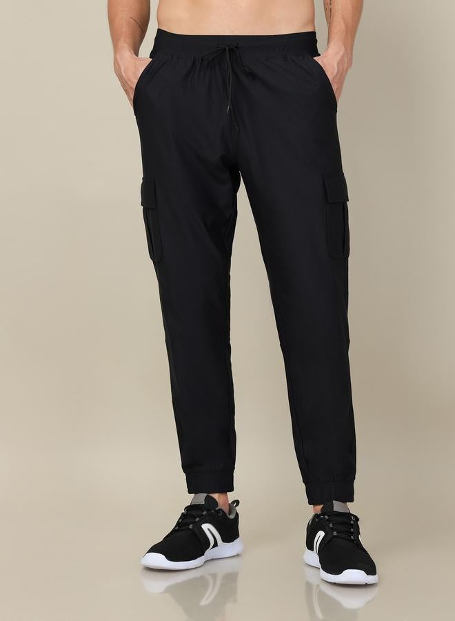 تكنوسبورت بنطلون رياضي رجالي تكنوسبورت بقصة ضيقة بلون سادة مع تقنية دوراكول بلس - Image 1