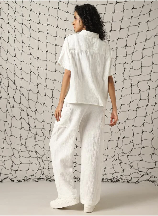 هوبرهولمي Women Co-ord in Off white featuring Oversized fit with a solid pattern, spread collar collar, spread collar neckline, half sleeves, regular length, secured with button closure, crafted from cotton – an essential addition to your stylish collection.