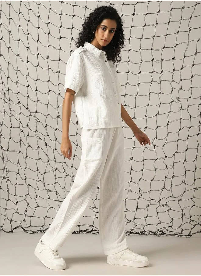 هوبرهولمي Women Co-ord in Off white featuring Oversized fit with a solid pattern, spread collar collar, spread collar neckline, half sleeves, regular length, secured with button closure, crafted from cotton – an essential addition to your stylish collection.