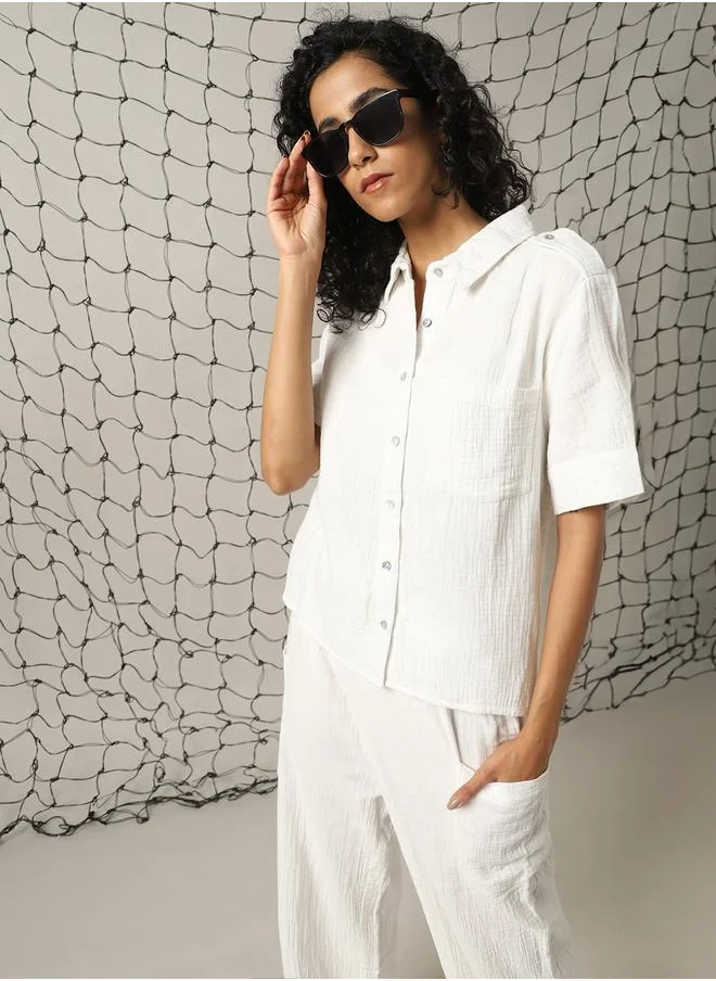 هوبرهولمي Women Co-ord in Off white featuring Oversized fit with a solid pattern, spread collar collar, spread collar neckline, half sleeves, regular length, secured with button closure, crafted from cotton – an essential addition to your stylish collection.