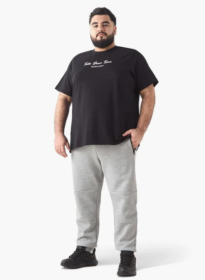 سبلاش فيڤ تيشيرت بياقة دائرية وطبعة شعار بمقاس كبير