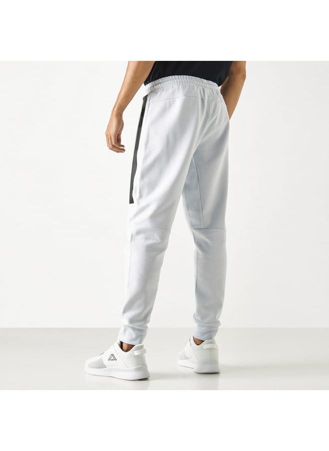 Kappa Logo Detail Joggers with Pockets and Drawstring Closure - pzsku/ZE9758958DD0E13BB1069Z/45/_/1728454127/2edf7e05-c93b-45c9-9ad4-f3a21c985741