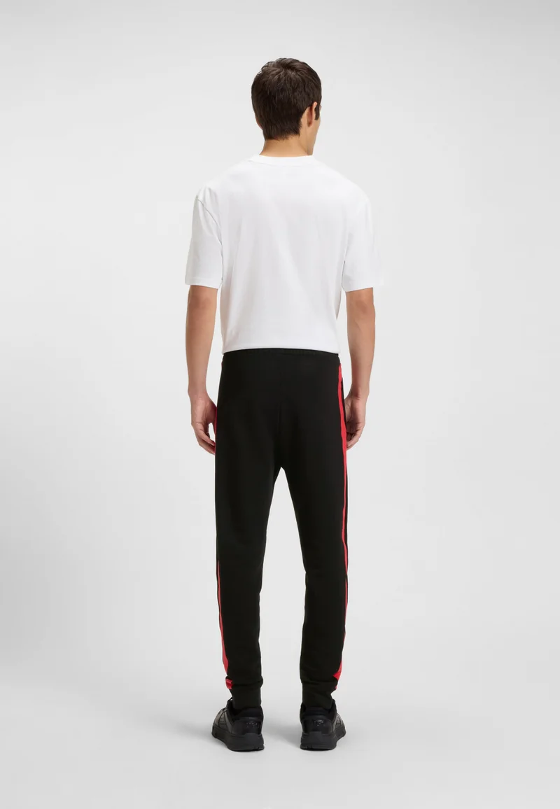 هوجو بنطلون رياضي قطني تيري بخطوط جانبية متباينة