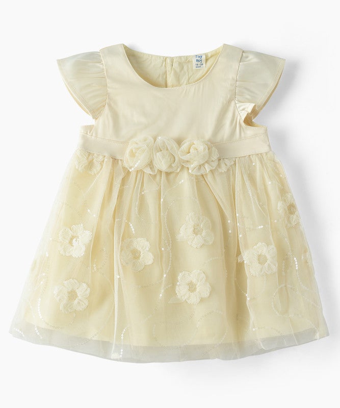 TINY HUG BABY GIRLS FLORAL TEXTURED PARTY DRESS WITH MESH OVERLAY AND WAIST BOW - Image 1
