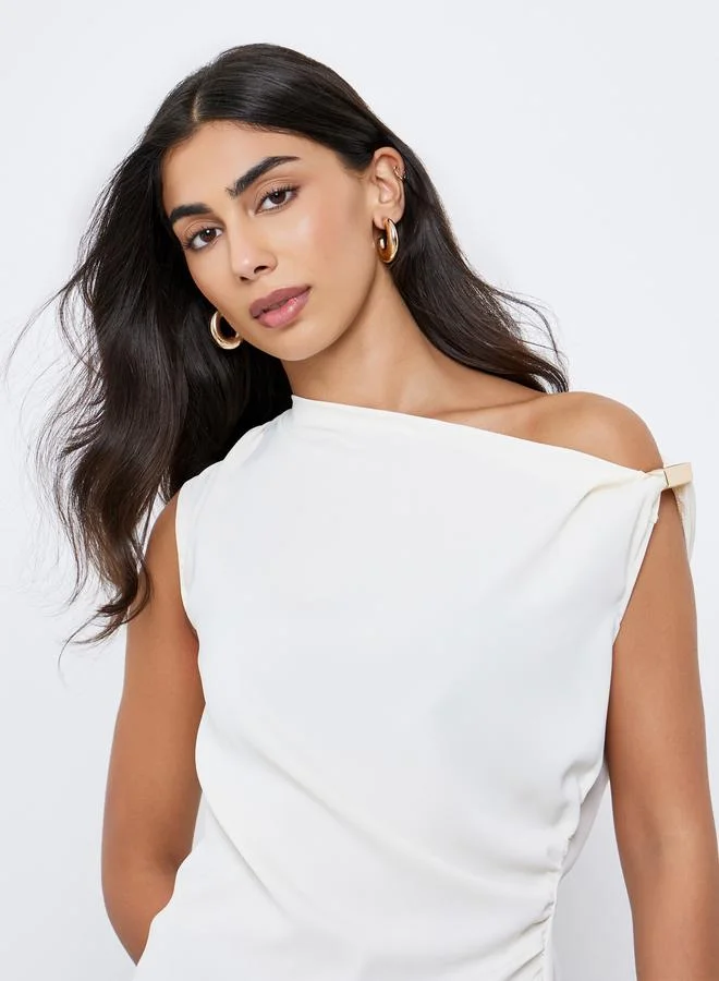 ستايلي بلوزة سادة بياقة غير متماثلة