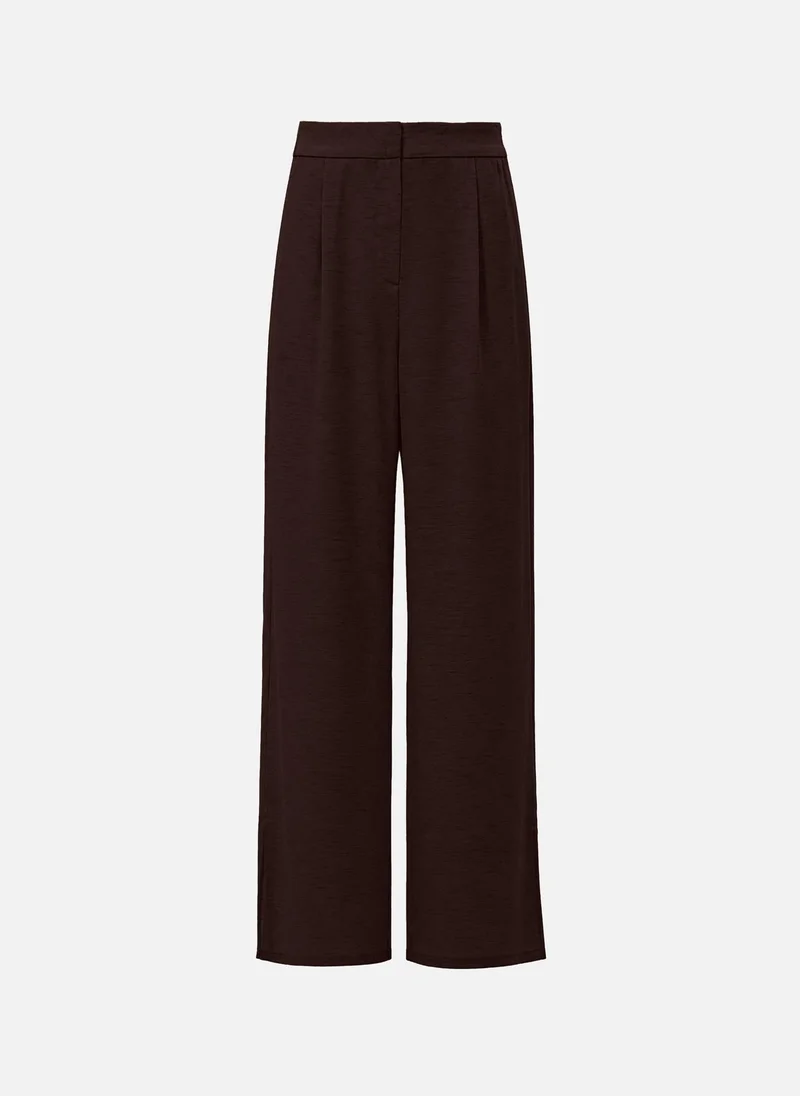 Lichi Loose-fitting viscose and linen trousers with pleats at the waist
