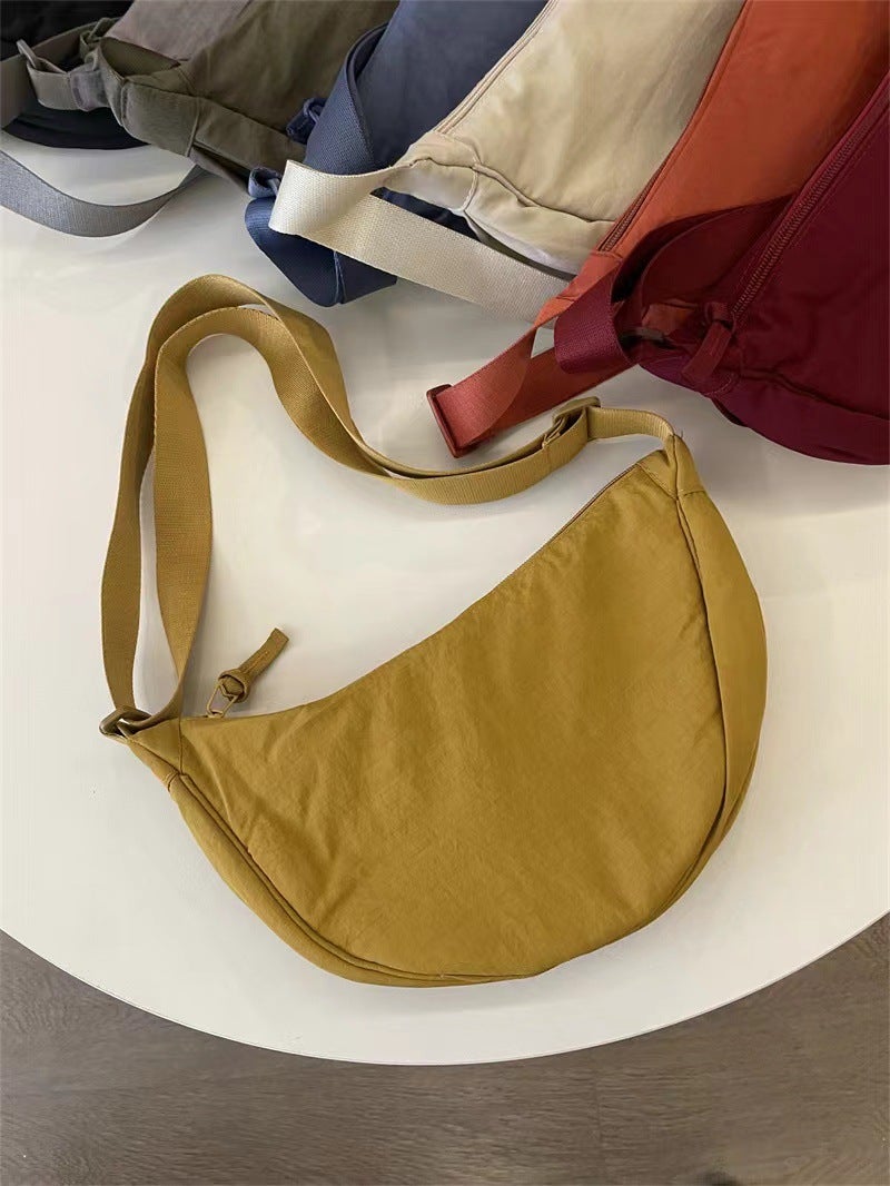 U home fitting room with female messenger bag small red book nylon dumpling bag student shoulder bag cloth bag factory supply Lemon yellow