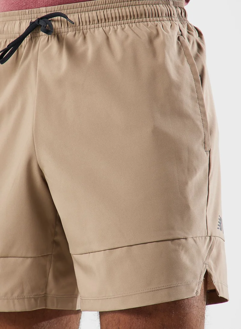 New Balance 7" Tenacity Woven Shorts