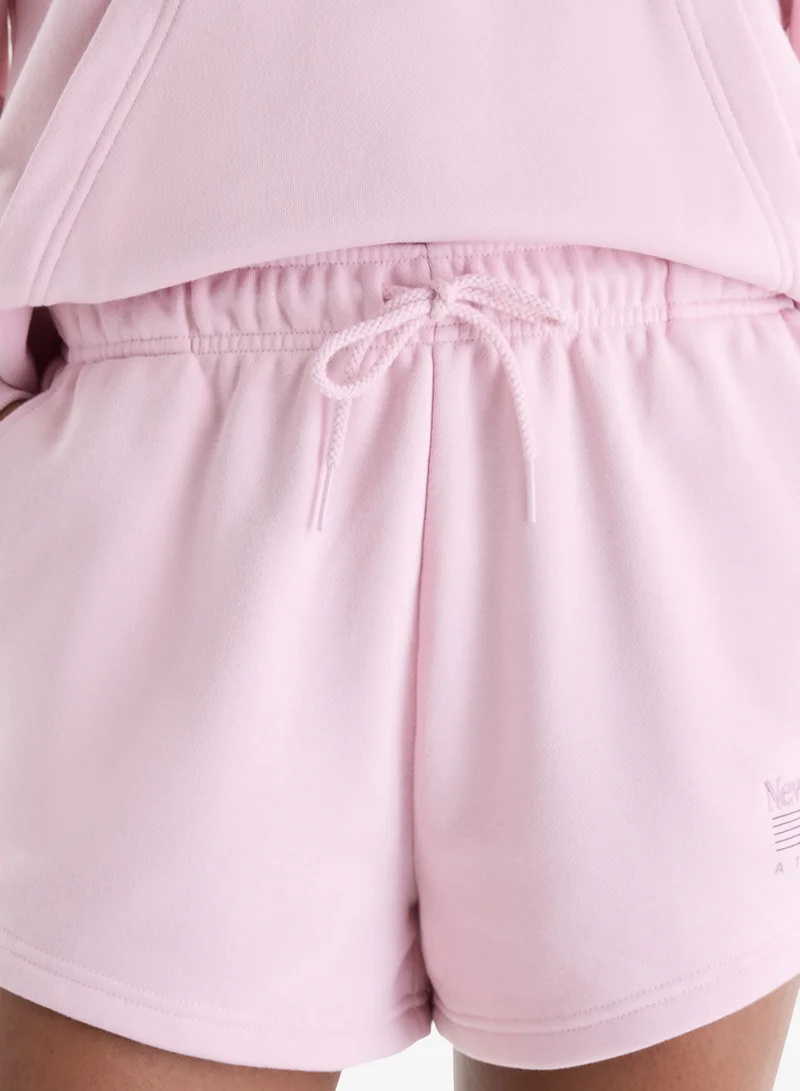 New Balance PINK CHALK (PHK) Trackside French Terry Shorts for Women | Best Price UAE
