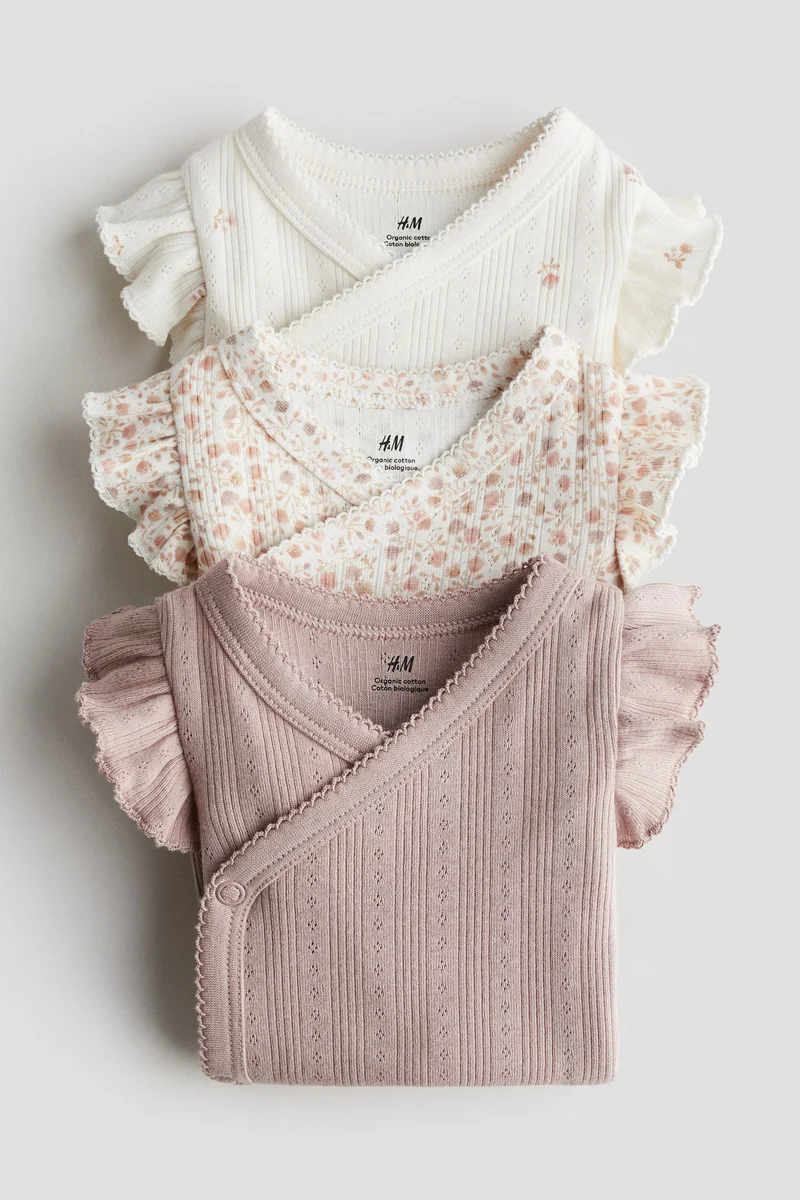 اتش اند ام بودي سوت برقبة ملفوفة من نسيج بثقوب عبوة من 3 قطع