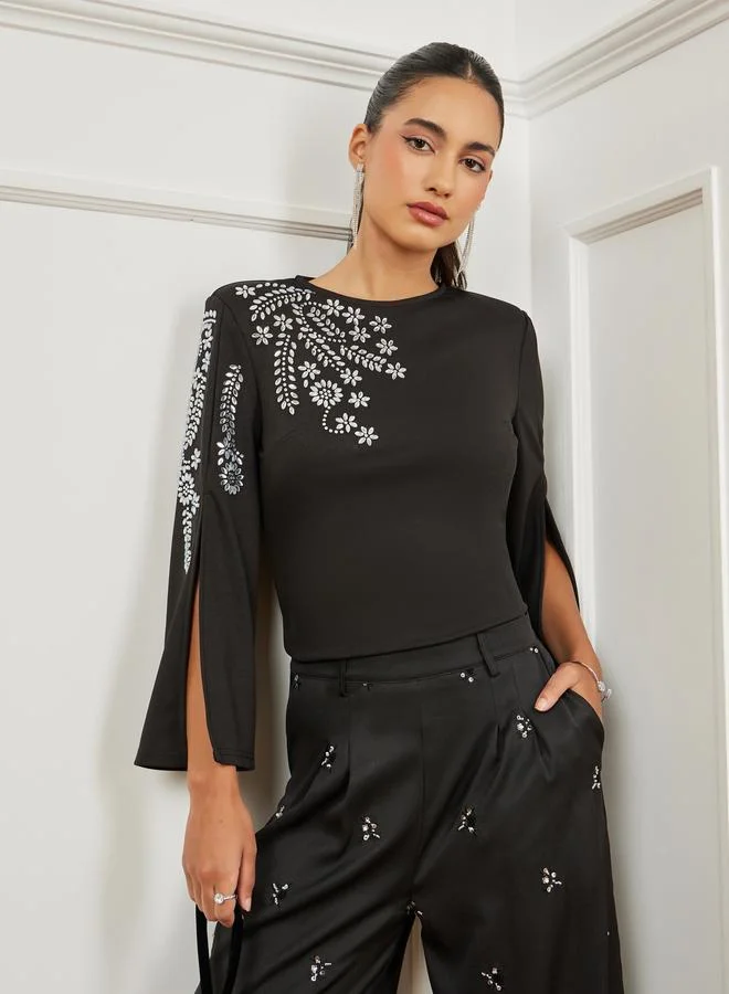 Styli Black Shoulder Padded Slit Sleeve Embellished Top