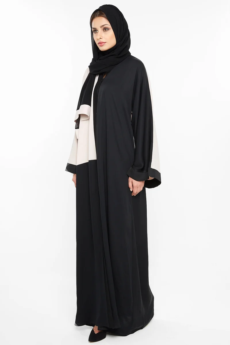 النخبة عباية قص عرضي كاجوال باللونين الأسود والكريمي
