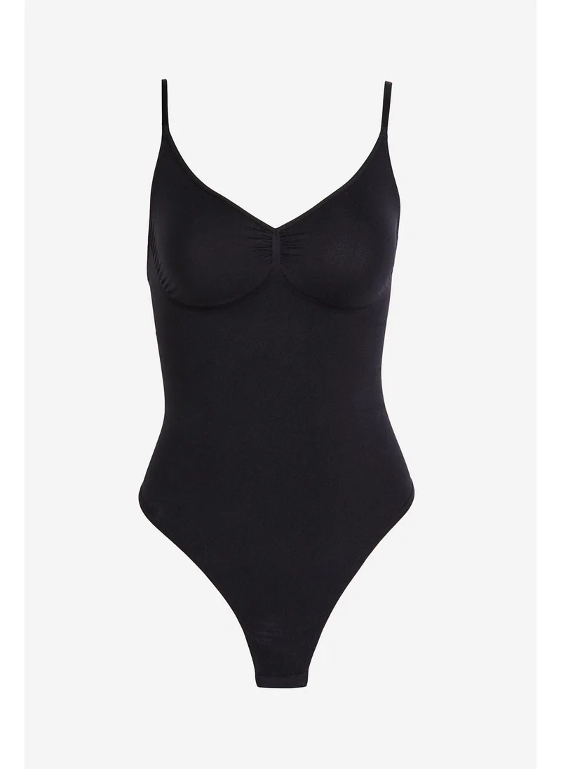 اتش اند ام Stretchy & sculpting firm shape thong body