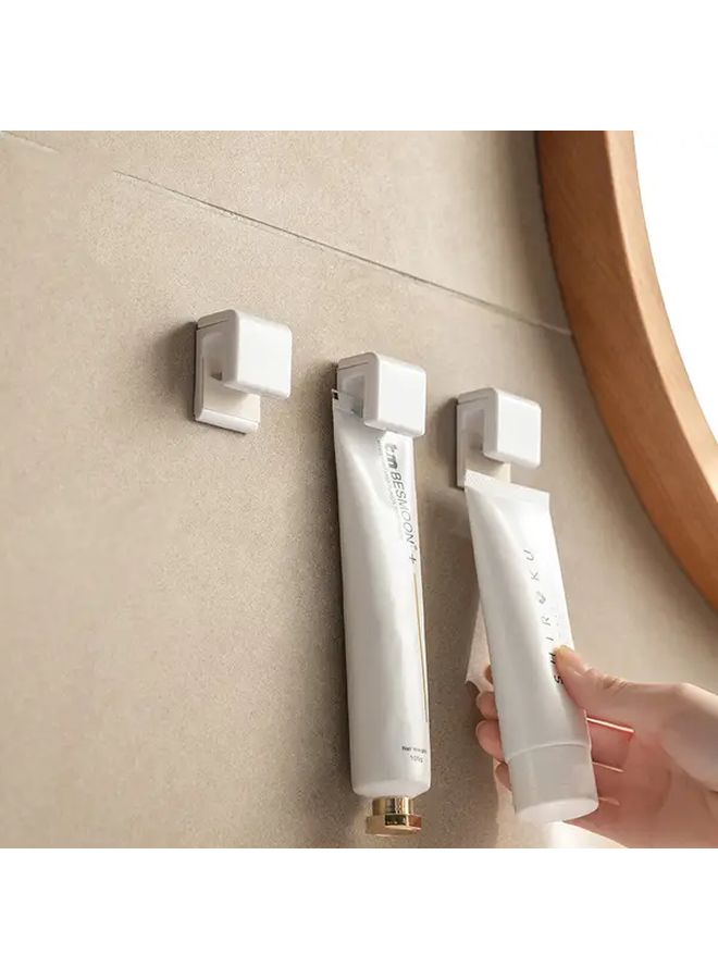 White 2Pcs No Drill Adhesive Toothpaste Holder Wall Mounted Bathroom Organizer Strong Glue Space Saving - Image 2