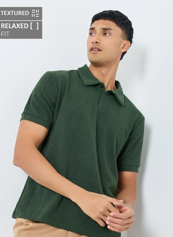 ستايلي تيشيرت بولو محبوك بنسيج كابل بقصة مريحة