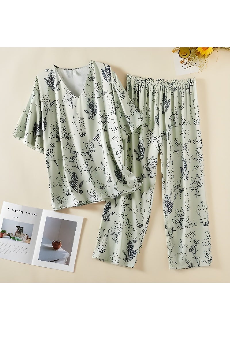 طقم بيجامة نسائي قطعتين من الحرير – مقاس حر – قماش ناعم وخفيف – بلوزة بأكمام قصيرة وياقة على شكل V وبنطال بخصر مطاطي – ملابس نوم وراحة مريحة