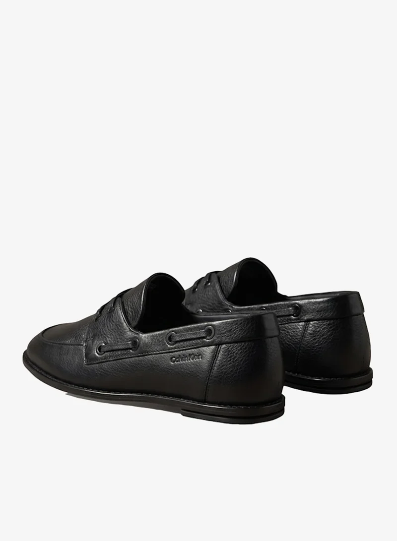 Calvin Klein  Pebble-Grain Leather Boat Shoes for Women | Best Price UAE