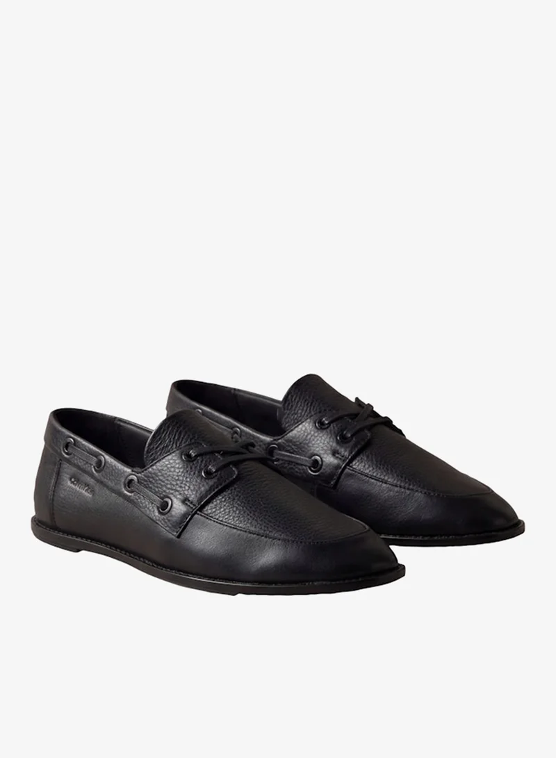 Calvin Klein  Pebble-Grain Leather Boat Shoes for Women | Best Price UAE