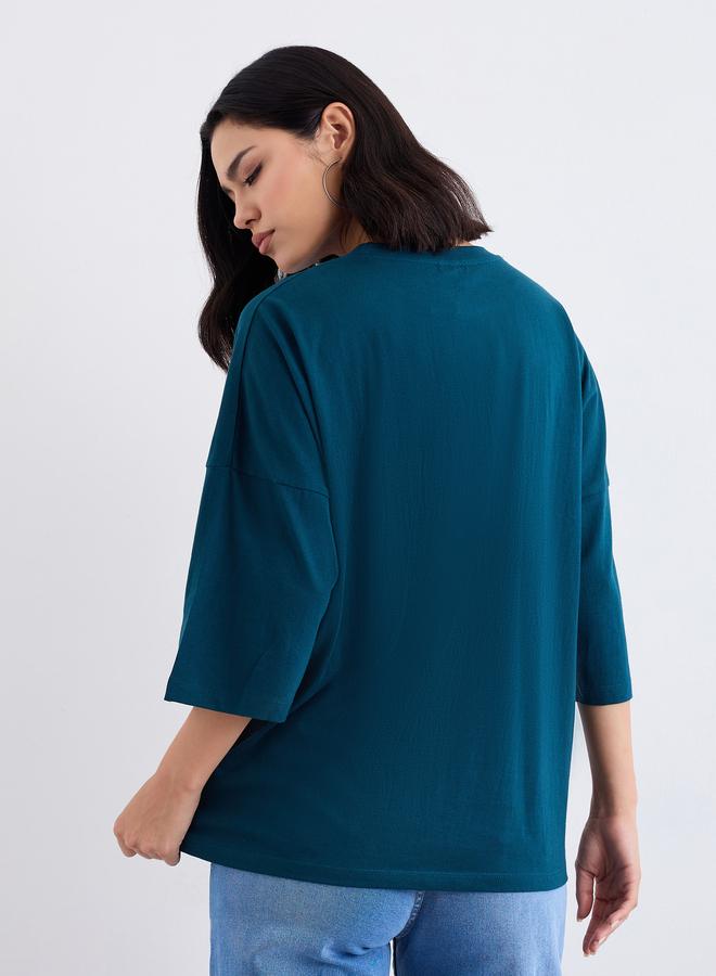 ستايلي تيشيرت نسائي فضفاض بأكتاف بارزة بلون أخضر داكن - Image 4