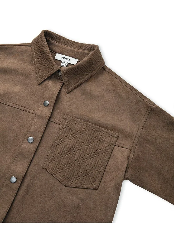 ابيكول قميص بتفاصيل مونوغرام