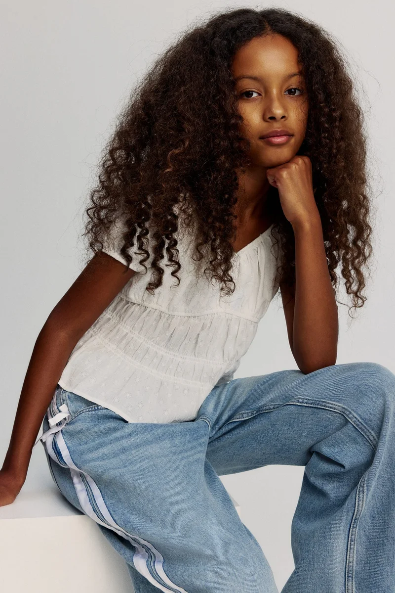 H&M Smocked cotton blouse