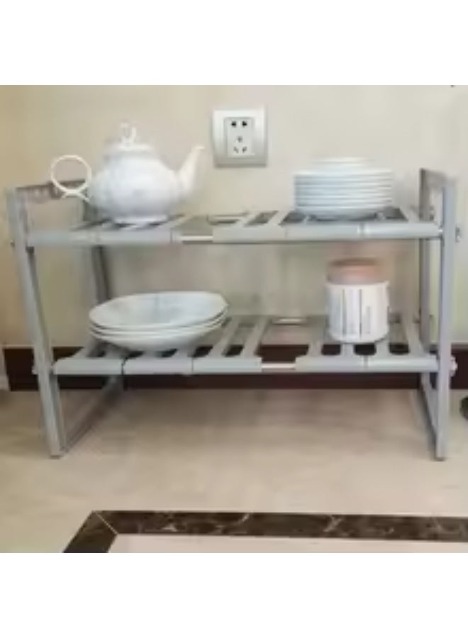 منظم قابل للتوسيع من طبقتين يُوضع أسفل الحوض - رف تخزين مطبخ قابل للتعديل مزود بأنابيب من الفولاذ المقاوم للصدأ وأرفف بلاستيكية قابلة للإزالة لتنظيم الحمام والمخزن والخزائن - Image 5