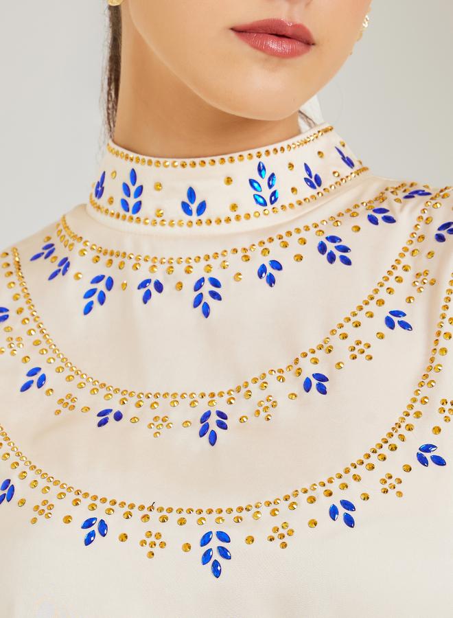 ستايلي فستان طويل كريمي بليسيه مزين - Image 4