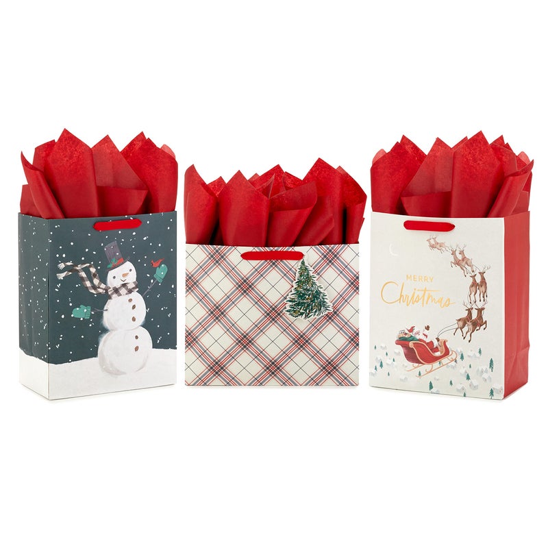 Hallmark Christmas Gift Bag Assortment with Tissue Paper 3 Bags 2 Large 13 1 Large Horizontal 10 Santa with Sleigh Red and Green Plaid Snowman on Black