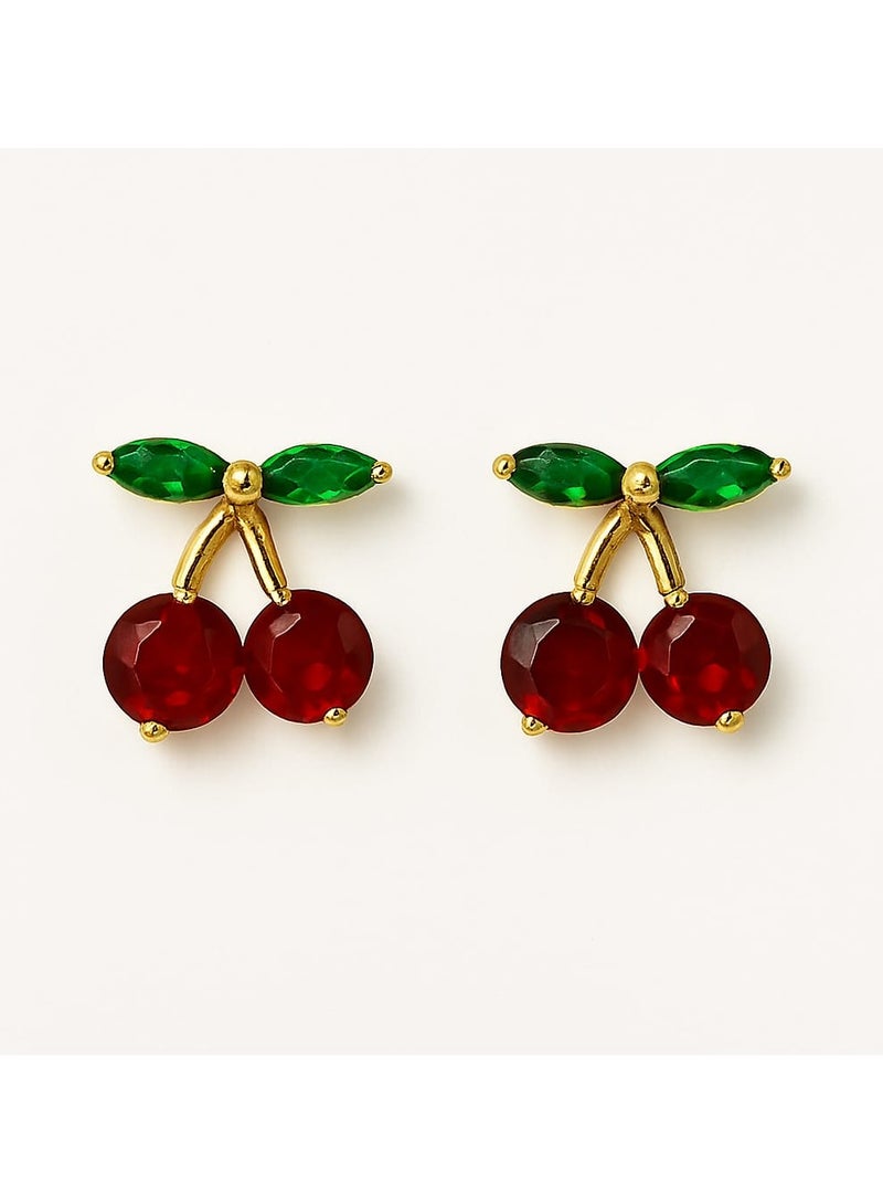"A playful, feminine touch - made of stainless steel. Add a fresh, playful touch to your look with this cherry earring. Its unique design combines two rich red beads with an elegant gold stem, punctuated by tiny green leaves, adding a charming, natural touch. Perfect for those who love subtle details and unconventional, distinctive looks." - Image 2