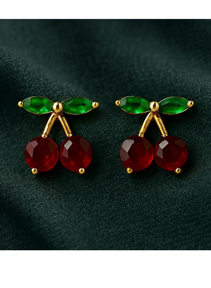 "A playful, feminine touch - made of stainless steel. Add a fresh, playful touch to your look with this cherry earring. Its unique design combines two rich red beads with an elegant gold stem, punctuated by tiny green leaves, adding a charming, natural touch. Perfect for those who love subtle details and unconventional, distinctive looks." - Image 5