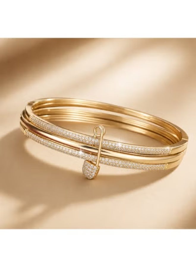 veya Gold-tone women's bracelet featuring a safety pin design embellished with sparkling stones – a stylish accessory for everyday looks and special occasions. - Image 3