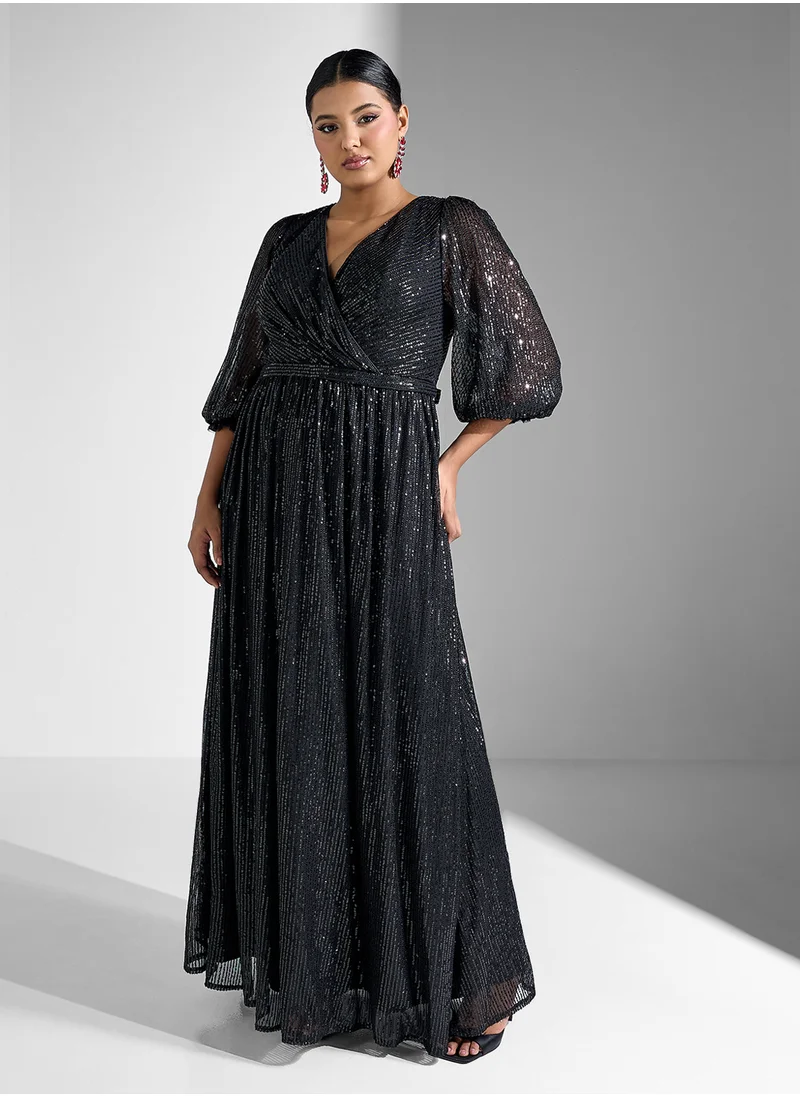 Khizana Plus size surplice neck shimmer dress