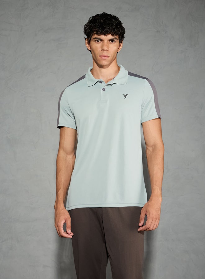 تكنوسبورت تيشيرت بولو رجالي تكنوسبورت بلون متداخل بقصة مريحة - Image 1
