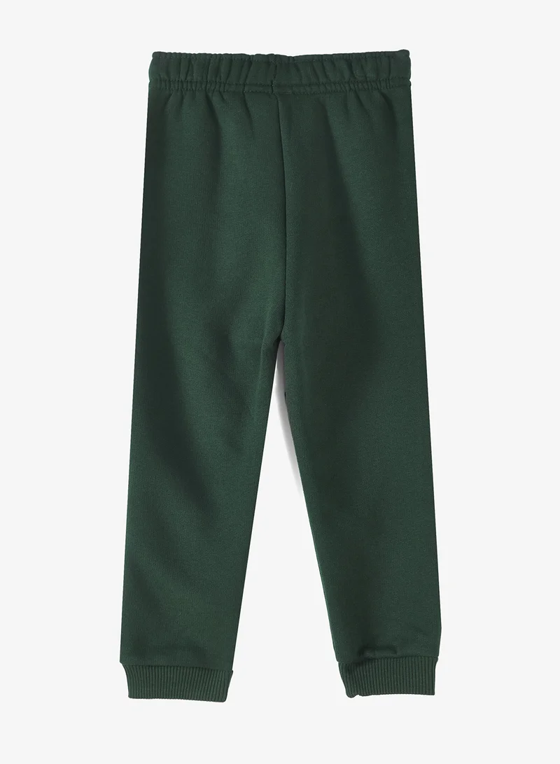 لاكوست بنطلون رياضي للأطفال بأساور