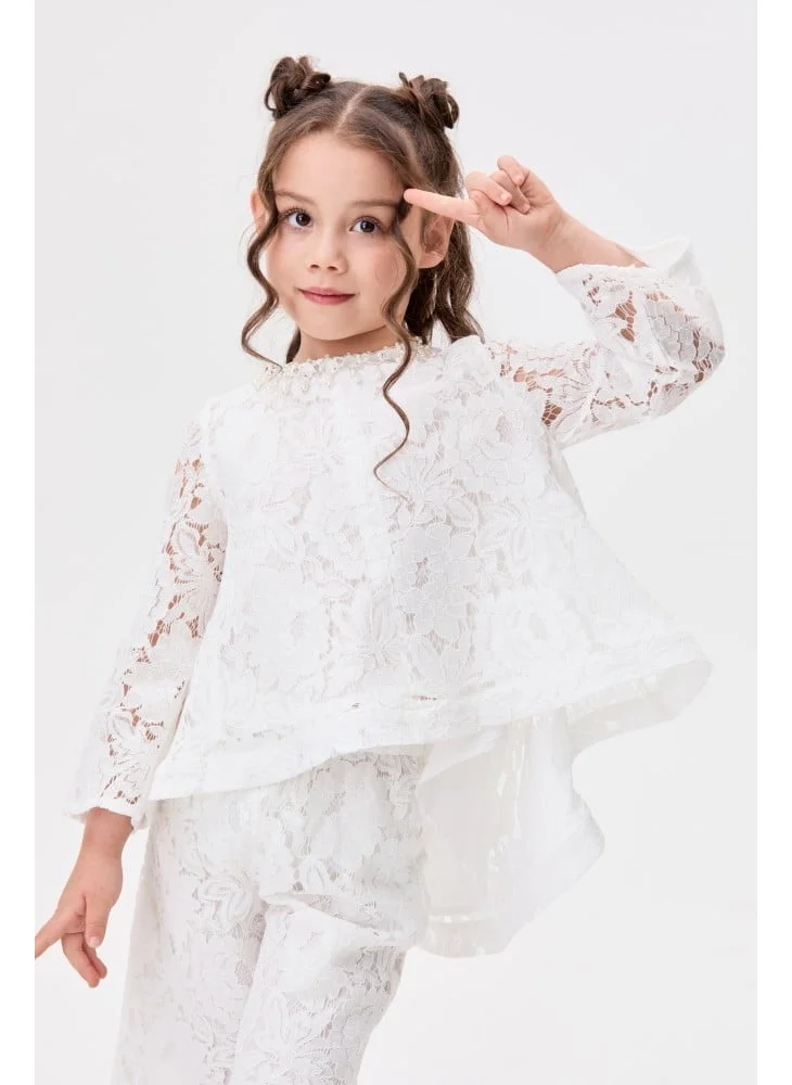 Tenda Asymmetrical lace blouse