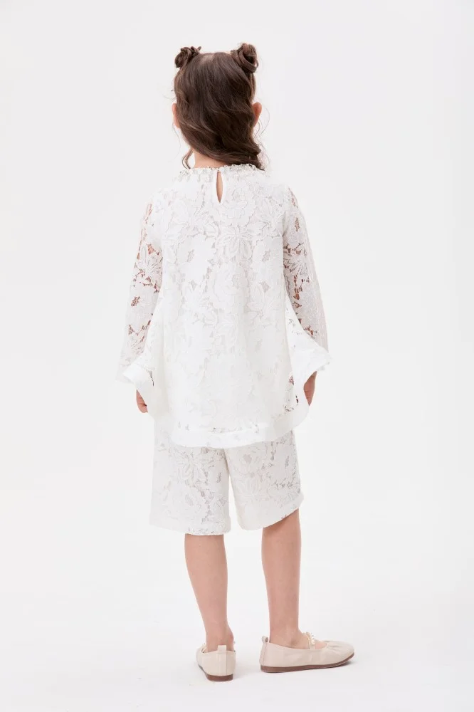 Tenda Asymmetrical lace blouse