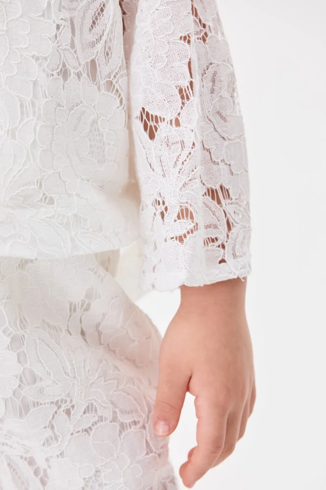 Tenda Asymmetrical lace blouse
