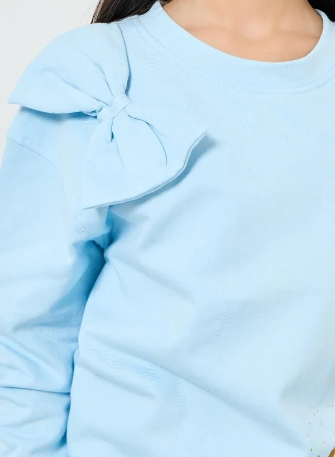 ستايلي سويت شيرت مطبوع بتفاصيل فيونكة