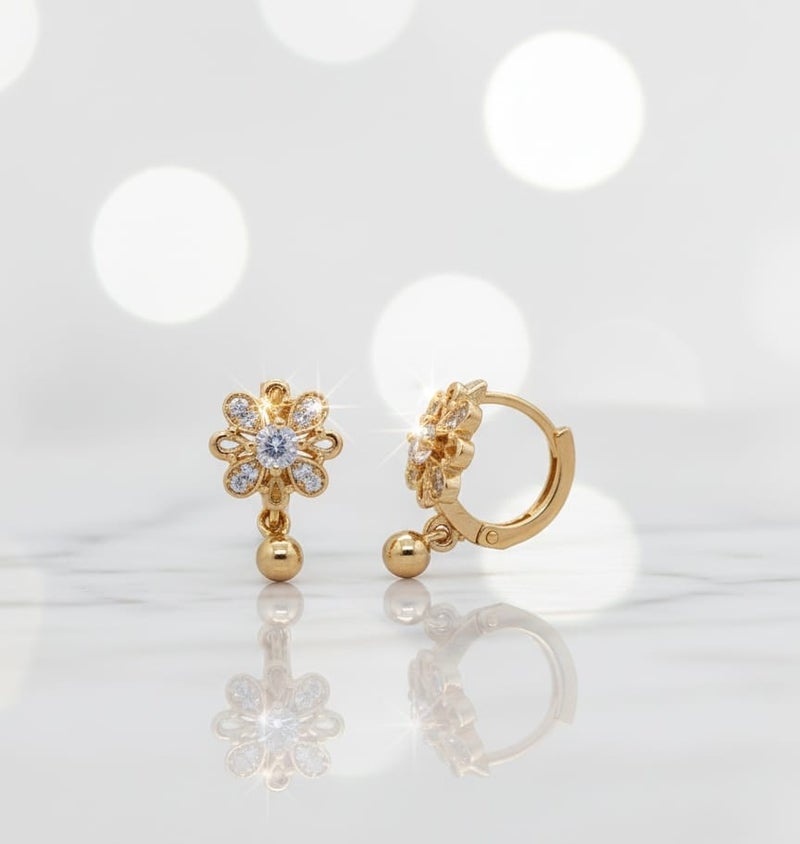 A delicate gold-plated earring featuring a sparkling flower design with dazzling stones that add elegance and radiance, completed with a small gold ball-shaped pendant. - Image 4