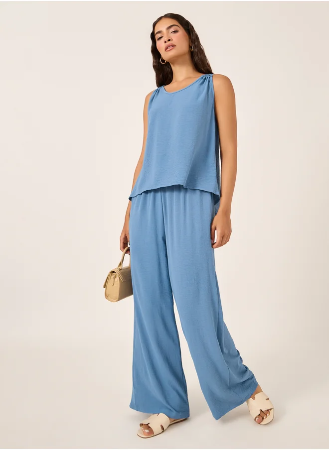 Styli Solid Lace Insert Sleeveless Top and Wide Leg Pants Co-Ords