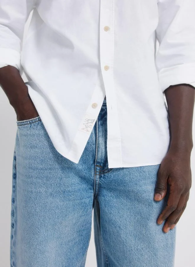 Springfield  Regular fit long-sleeved shirt. lightweight oxford fabric yarn-dyed 100% cotton. raw button and striped ribbon on the inner neck for decoration. Springfield logo embroidered in tone. for Men | Best Price UAE