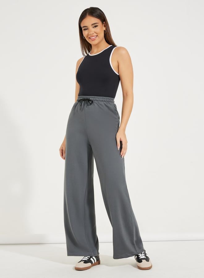 Styli Solid Wide Leg Joggers with Drawstrings - Image 1