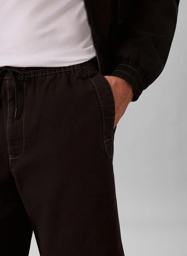 Calvin Klein Jeans  Cotton Canvas Drawstring Shorts for Men | Best Price UAE
