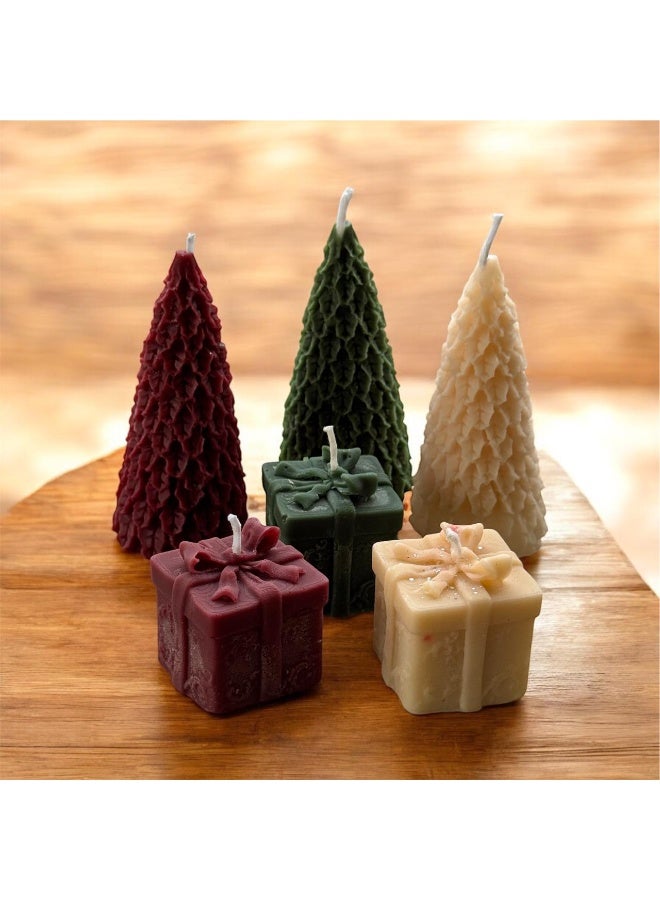 مجموعة شموع ديكورية لعيد الميلاد بشكل شجرة وهدايا – تصميم أنيق لأجواء شتوية دافئة