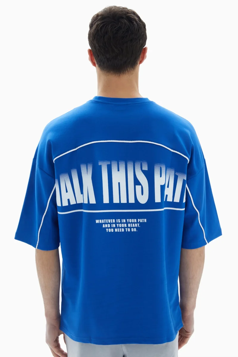 Wecre8 Blue "Walk This Path" Printed T-shirt By WECRE8