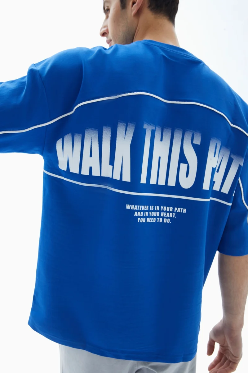 Wecre8 Blue "Walk This Path" Printed T-shirt By WECRE8