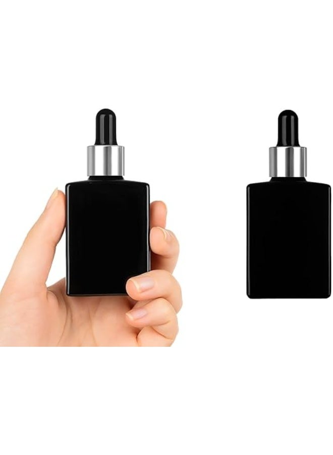 ٢ عبوة قطّارة زجاجية مربعة باللون الأسود – سعة 30 مل قابلة لإعادة التعبئة للسيروم، الزيوت العطرية، والمستحضرات التجميلية