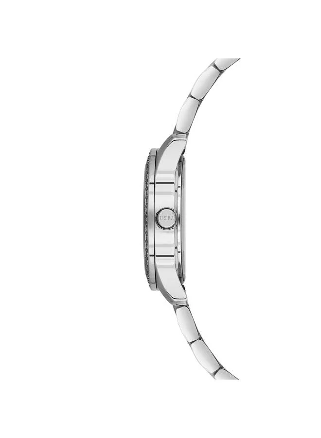 يو اس بولو اسن ساعة نسائية فضية بقرص فضي وسوار من الفولاذ المقاوم للصدأ بعقارب مقاس  مم