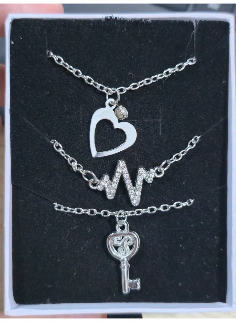 بريميم طقم أساور فضية مكون من 3 قطع للنساء - تصميم على شكل قلب، نبض الحب، ومفتاح مع لمسات كريستالية - Image 1