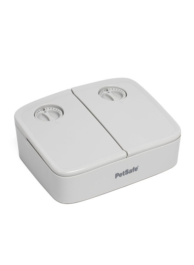 بيت سيف موزع طعام الحيوانات الأليفة PetSafe Analog القابل للبرمجة لوجبتين، موزع طعام أوتوماتيكي للكلاب والقطط - موزع طعام جاف أو شبه رطب، تحكم بطيء في كمية الطعام (سعة إجمالية 3 أكواب/16 أونصة)، تصميم مقاوم للعبث - Image 1